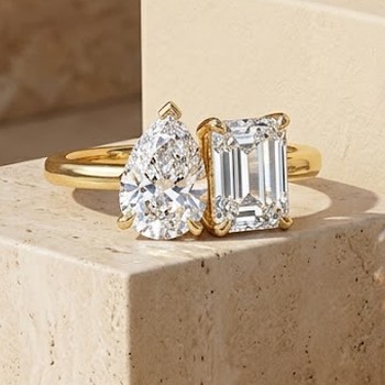 The Carlton — toi et moi engagement ring with pear and emerald-cut diamonds